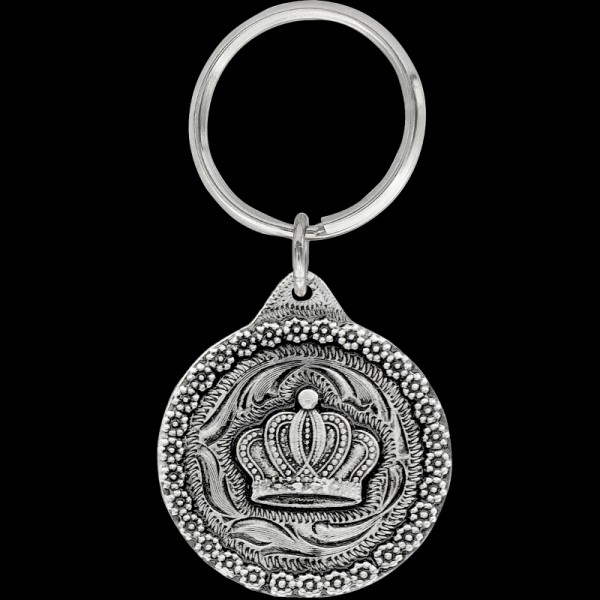 Celebrate rodeo royalty with our Rodeo Queen Crown Keychain. Perfect for cowgirls and enthusiasts alike, this finely crafted accessory adds a touch of regal charm to your everyday carry. 